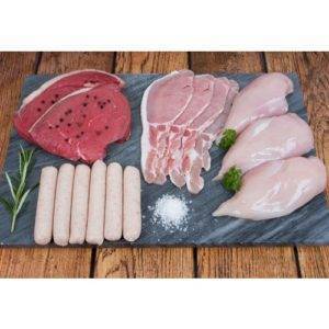Raw selection of meat in weekly meat pack