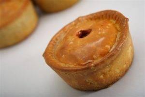 50oz pork pie on a white background