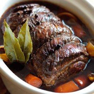 brisket beef in a dish with veg and garnish