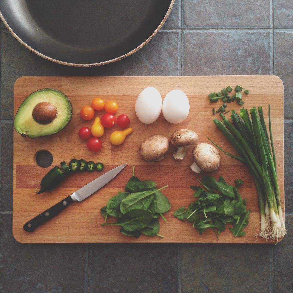 Various chopped ingredients on a chopping board