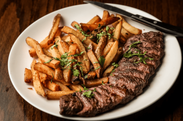 steak and chips on a plate